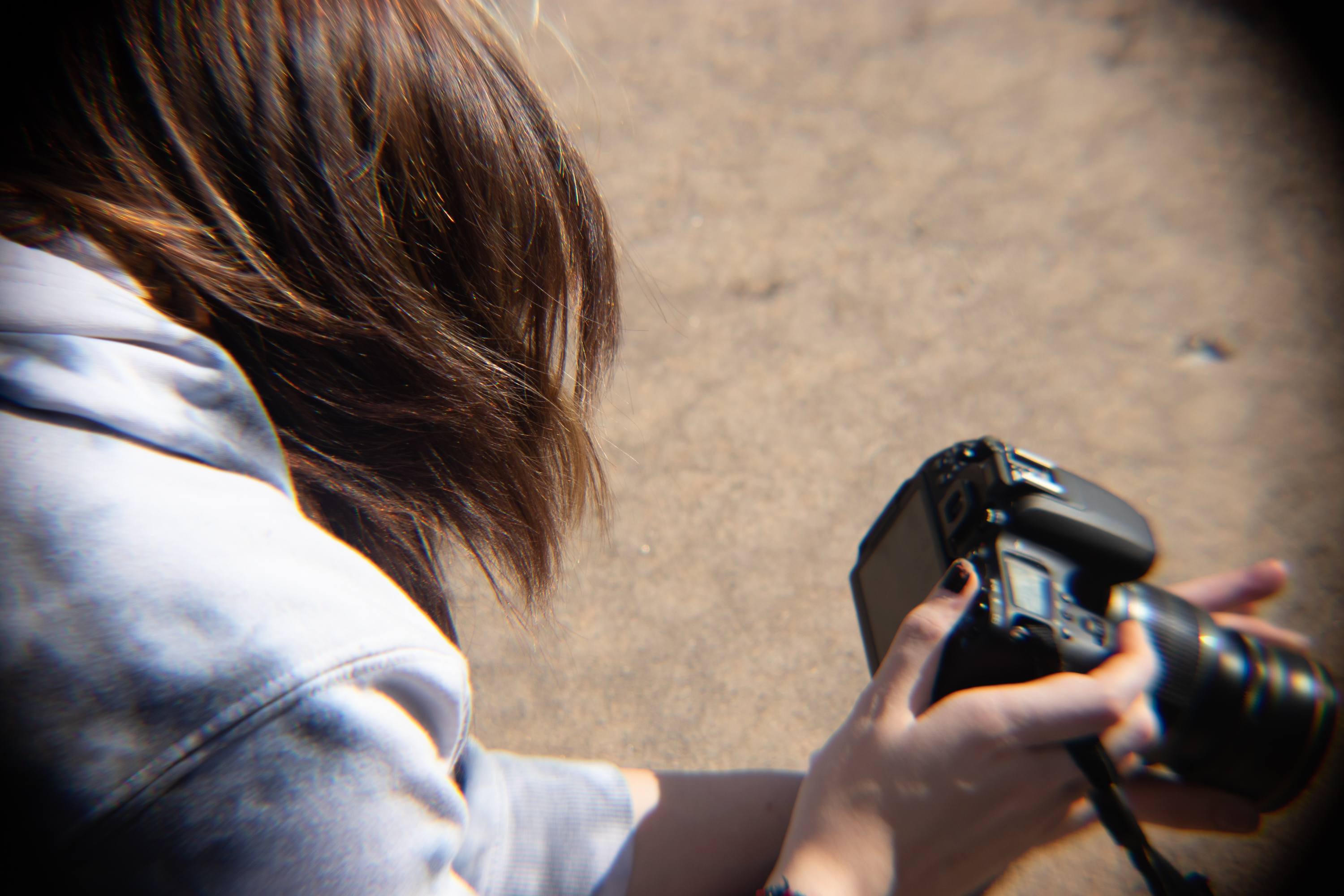 Shot of a young woman taking a photo.